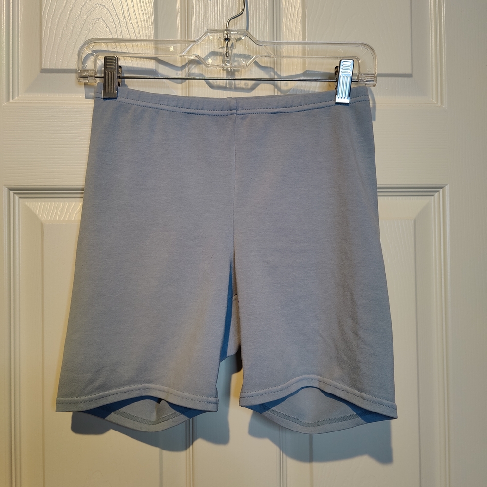 SKIMS Blue Bike Shorts with Form-Fitting Design and Curved Hem